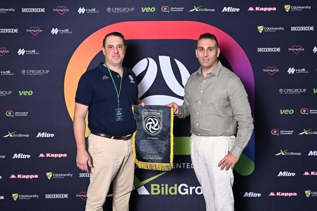 Soccerscene CEO Stace Ioannidis presenting the Editorial Creed to Football Queensland CEO Rob Cavalucci to elevate the debate in Australian football