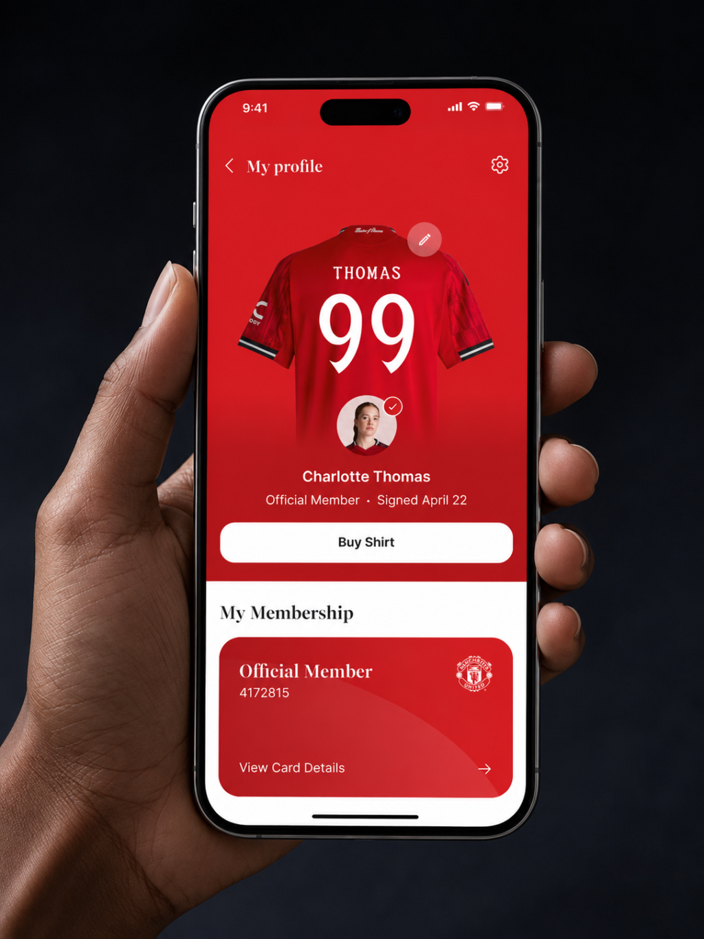 Manchester United digital football membership app on smartphone showing member profile, membership card and club benefits.